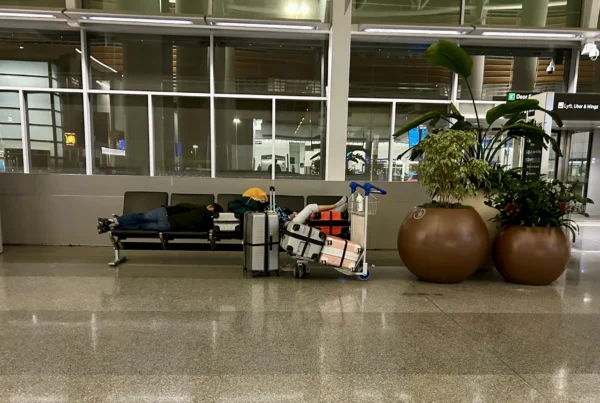 person sleeping on a bench